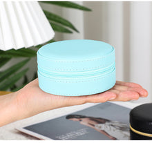 Load image into Gallery viewer, Blue compact travel jewelry box with zip closure and velvet interior